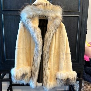 Stunning cream pieced mink coat with fox trim  from HARPERS IN FAIRFIELD Ct.